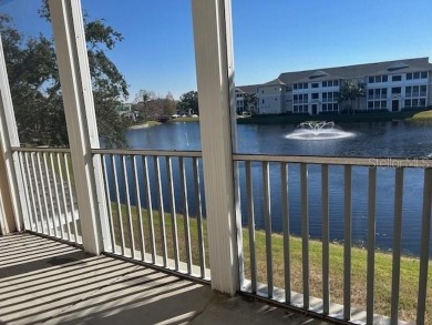 This ideal second floor condo has a sweeping view of the lake on Manatee County Golf Course in Florida - for sale on GolfHomes.com, golf home, golf lot