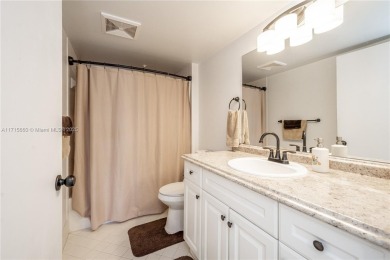 BEAUTIFUL 2 BEDROOMS 2 BATHROOMS LARGE UNIT OVERLOOKING A on Flamingo Lakes Country Club in Florida - for sale on GolfHomes.com, golf home, golf lot