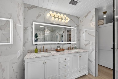 Stunning fully renovated single-family home in coveted on  in Florida - for sale on GolfHomes.com, golf home, golf lot