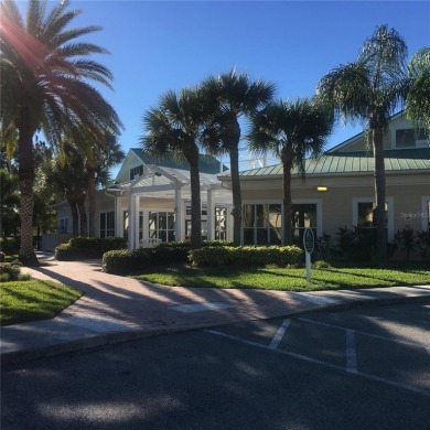 This ideal second floor condo has a sweeping view of the lake on Manatee County Golf Course in Florida - for sale on GolfHomes.com, golf home, golf lot