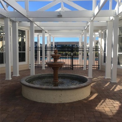 This ideal second floor condo has a sweeping view of the lake on Manatee County Golf Course in Florida - for sale on GolfHomes.com, golf home, golf lot