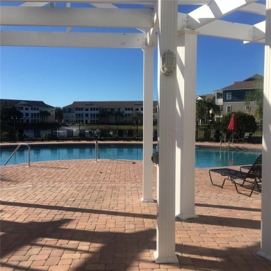 This ideal second floor condo has a sweeping view of the lake on Manatee County Golf Course in Florida - for sale on GolfHomes.com, golf home, golf lot