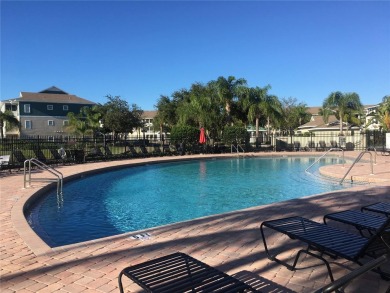 This ideal second floor condo has a sweeping view of the lake on Manatee County Golf Course in Florida - for sale on GolfHomes.com, golf home, golf lot