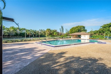 BEAUTIFUL 2 BEDROOMS 2 BATHROOMS LARGE UNIT OVERLOOKING A on Flamingo Lakes Country Club in Florida - for sale on GolfHomes.com, golf home, golf lot