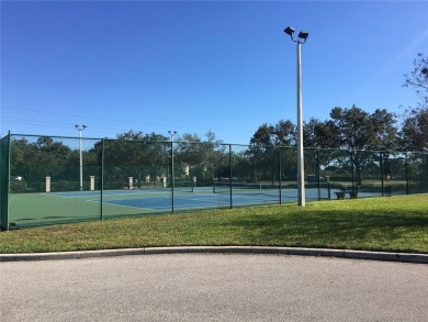 This ideal second floor condo has a sweeping view of the lake on Manatee County Golf Course in Florida - for sale on GolfHomes.com, golf home, golf lot