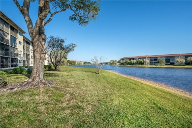 BEAUTIFUL 2 BEDROOMS 2 BATHROOMS LARGE UNIT OVERLOOKING A on Flamingo Lakes Country Club in Florida - for sale on GolfHomes.com, golf home, golf lot