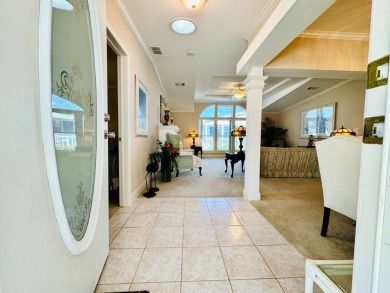 This 2001 Palm Harbor - St Andrews model home is situated on on Crane Lakes Golf and Country Club in Florida - for sale on GolfHomes.com, golf home, golf lot