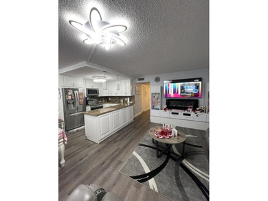 YOU WILL LOVE THIS PLACE! Cozy, clean, and modern condo in on Hillsboro Pines Golf in Florida - for sale on GolfHomes.com, golf home, golf lot