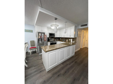 YOU WILL LOVE THIS PLACE! Cozy, clean, and modern condo in on Hillsboro Pines Golf in Florida - for sale on GolfHomes.com, golf home, golf lot