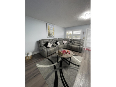 YOU WILL LOVE THIS PLACE! Cozy, clean, and modern condo in on Hillsboro Pines Golf in Florida - for sale on GolfHomes.com, golf home, golf lot