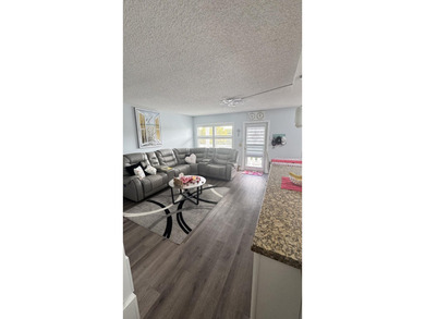 YOU WILL LOVE THIS PLACE! Cozy, clean, and modern condo in on Hillsboro Pines Golf in Florida - for sale on GolfHomes.com, golf home, golf lot