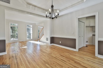 This lovely 4BR/3.5 BA Two-story home sits on a generous 1 acre on Canongate At Flat Creek Club in Georgia - for sale on GolfHomes.com, golf home, golf lot
