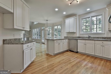 This lovely 4BR/3.5 BA Two-story home sits on a generous 1 acre on Canongate At Flat Creek Club in Georgia - for sale on GolfHomes.com, golf home, golf lot