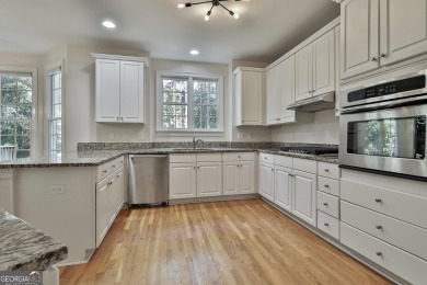 This lovely 4BR/3.5 BA Two-story home sits on a generous 1 acre on Canongate At Flat Creek Club in Georgia - for sale on GolfHomes.com, golf home, golf lot