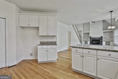 This lovely 4BR/3.5 BA Two-story home sits on a generous 1 acre on Canongate At Flat Creek Club in Georgia - for sale on GolfHomes.com, golf home, golf lot