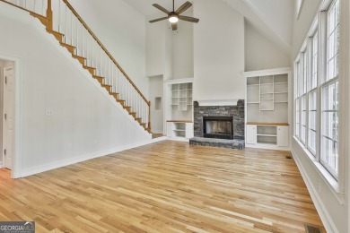 This lovely 4BR/3.5 BA Two-story home sits on a generous 1 acre on Canongate At Flat Creek Club in Georgia - for sale on GolfHomes.com, golf home, golf lot