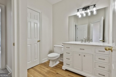 This lovely 4BR/3.5 BA Two-story home sits on a generous 1 acre on Canongate At Flat Creek Club in Georgia - for sale on GolfHomes.com, golf home, golf lot
