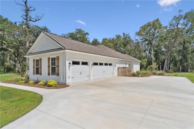 Situated on over an acre in the prestigious Sanctuary Cove on The Golf Club At Sanctuary Cove in Georgia - for sale on GolfHomes.com, golf home, golf lot