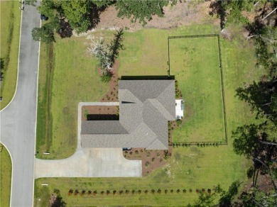 Situated on over an acre in the prestigious Sanctuary Cove on The Golf Club At Sanctuary Cove in Georgia - for sale on GolfHomes.com, golf home, golf lot