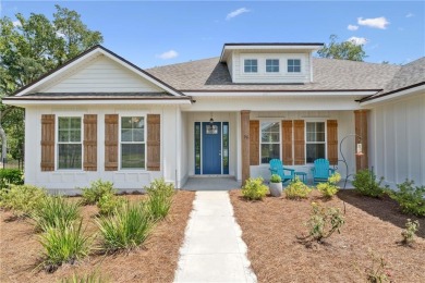 Situated on over an acre in the prestigious Sanctuary Cove on The Golf Club At Sanctuary Cove in Georgia - for sale on GolfHomes.com, golf home, golf lot