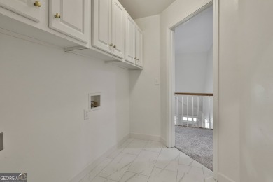 This lovely 4BR/3.5 BA Two-story home sits on a generous 1 acre on Canongate At Flat Creek Club in Georgia - for sale on GolfHomes.com, golf home, golf lot