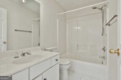 This lovely 4BR/3.5 BA Two-story home sits on a generous 1 acre on Canongate At Flat Creek Club in Georgia - for sale on GolfHomes.com, golf home, golf lot