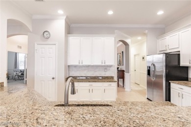 Experience the Florida living in this beautifully appointed on The Golf Club At Magnolia Landing in Florida - for sale on GolfHomes.com, golf home, golf lot