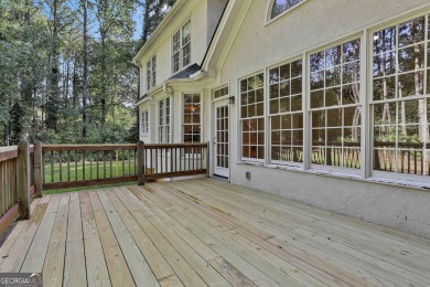 This lovely 4BR/3.5 BA Two-story home sits on a generous 1 acre on Canongate At Flat Creek Club in Georgia - for sale on GolfHomes.com, golf home, golf lot