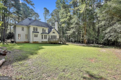 This lovely 4BR/3.5 BA Two-story home sits on a generous 1 acre on Canongate At Flat Creek Club in Georgia - for sale on GolfHomes.com, golf home, golf lot