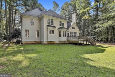 This lovely 4BR/3.5 BA Two-story home sits on a generous 1 acre on Canongate At Flat Creek Club in Georgia - for sale on GolfHomes.com, golf home, golf lot
