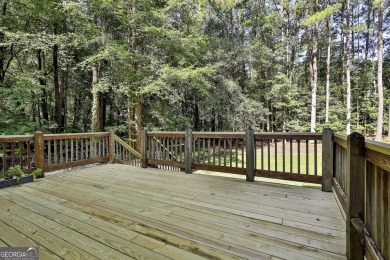 This lovely 4BR/3.5 BA Two-story home sits on a generous 1 acre on Canongate At Flat Creek Club in Georgia - for sale on GolfHomes.com, golf home, golf lot