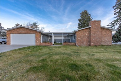 This one level home sits just off the 1st green of Lake Hills on Lake Hills Golf Course in Montana - for sale on GolfHomes.com, golf home, golf lot