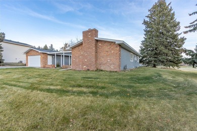 This one level home sits just off the 1st green of Lake Hills on Lake Hills Golf Course in Montana - for sale on GolfHomes.com, golf home, golf lot