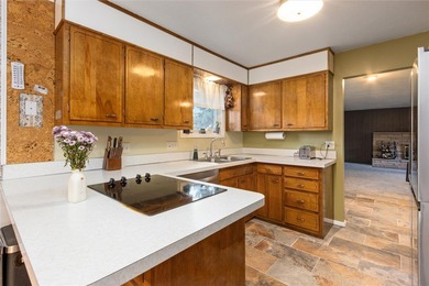 This one level home sits just off the 1st green of Lake Hills on Lake Hills Golf Course in Montana - for sale on GolfHomes.com, golf home, golf lot