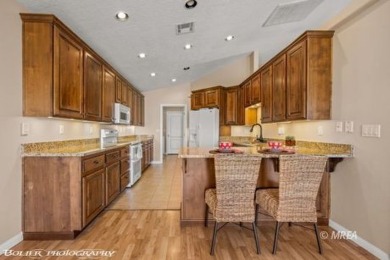 A resort style townhome overlooking the golf course driving on The Oasis Golf Club in Nevada - for sale on GolfHomes.com, golf home, golf lot