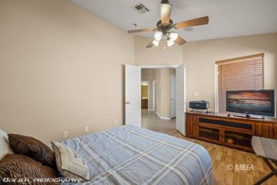 A resort style townhome overlooking the golf course driving on The Oasis Golf Club in Nevada - for sale on GolfHomes.com, golf home, golf lot