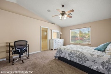 A resort style townhome overlooking the golf course driving on The Oasis Golf Club in Nevada - for sale on GolfHomes.com, golf home, golf lot