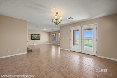 A resort style townhome overlooking the golf course driving on The Oasis Golf Club in Nevada - for sale on GolfHomes.com, golf home, golf lot