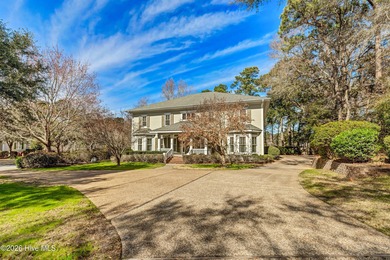 Grand home on the #6 hole of the Jack Nicklaus golf course in on Country Club of Landfall in North Carolina - for sale on GolfHomes.com, golf home, golf lot