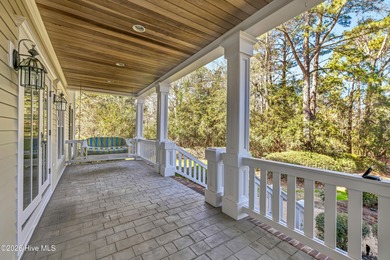 Grand home on the #6 hole of the Jack Nicklaus golf course in on Country Club of Landfall in North Carolina - for sale on GolfHomes.com, golf home, golf lot