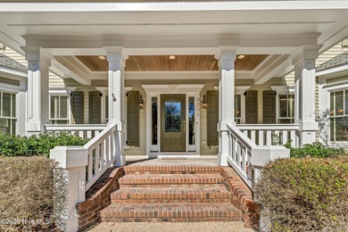 Grand home on the #6 hole of the Jack Nicklaus golf course in on Country Club of Landfall in North Carolina - for sale on GolfHomes.com, golf home, golf lot