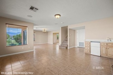 A resort style townhome overlooking the golf course driving on The Oasis Golf Club in Nevada - for sale on GolfHomes.com, golf home, golf lot