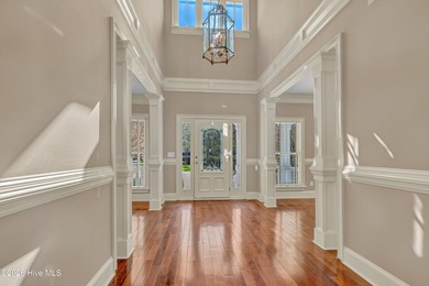 Grand home on the #6 hole of the Jack Nicklaus golf course in on Country Club of Landfall in North Carolina - for sale on GolfHomes.com, golf home, golf lot