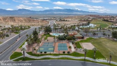 A resort style townhome overlooking the golf course driving on The Oasis Golf Club in Nevada - for sale on GolfHomes.com, golf home, golf lot