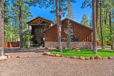 Discover timeless elegance and serene lake views in this on Pinetop Lakes Country Club in Arizona - for sale on GolfHomes.com, golf home, golf lot