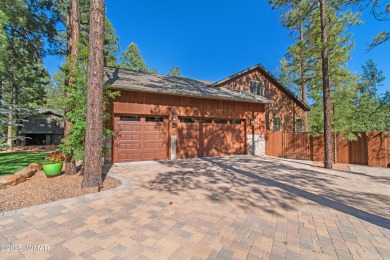 Discover timeless elegance and serene lake views in this on Pinetop Lakes Country Club in Arizona - for sale on GolfHomes.com, golf home, golf lot