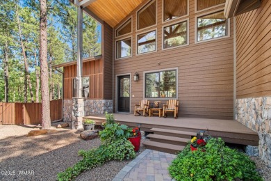 Discover timeless elegance and serene lake views in this on Pinetop Lakes Country Club in Arizona - for sale on GolfHomes.com, golf home, golf lot