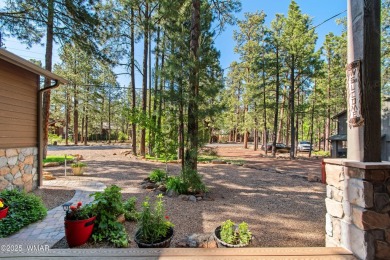 Discover timeless elegance and serene lake views in this on Pinetop Lakes Country Club in Arizona - for sale on GolfHomes.com, golf home, golf lot