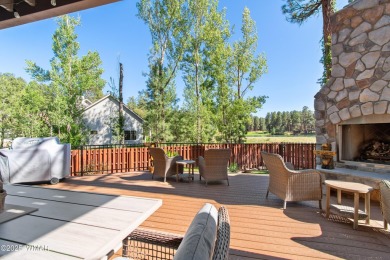 Discover timeless elegance and serene lake views in this on Pinetop Lakes Country Club in Arizona - for sale on GolfHomes.com, golf home, golf lot