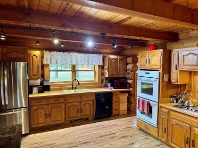 This Rocky Mountain Log Home has it all! Great value with this 2 on Double Arrow Lodge in Montana - for sale on GolfHomes.com, golf home, golf lot